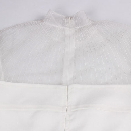 ROBE MINI AMPLE À VOLANTS