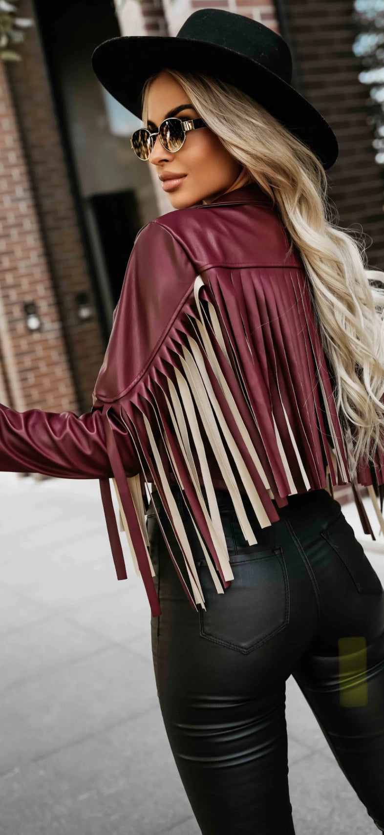 VESTE SIMILI CUIR À FRANGES