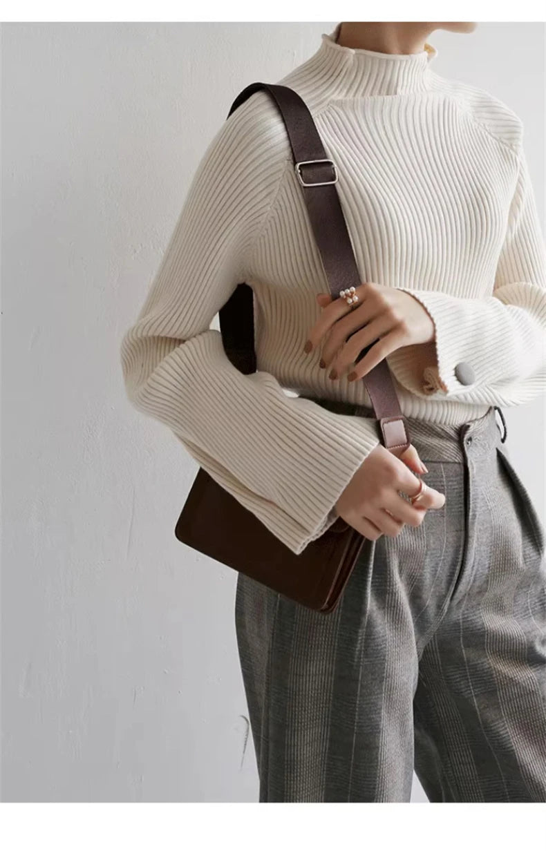 PULL COL ROULÉ BOUTONNÉ