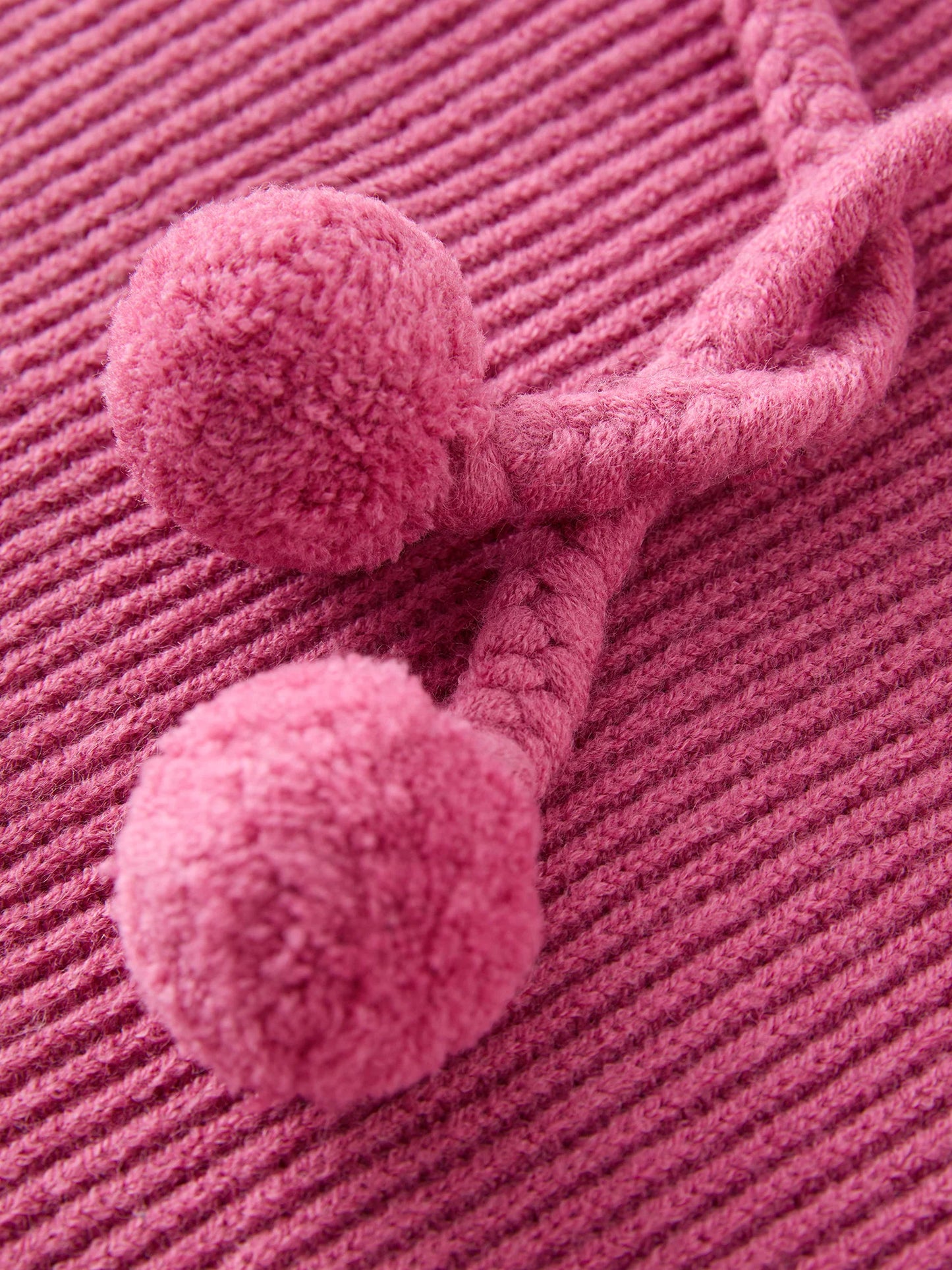 ROBE PULL À LACETS AVEC POMPON ET CAPUCHE