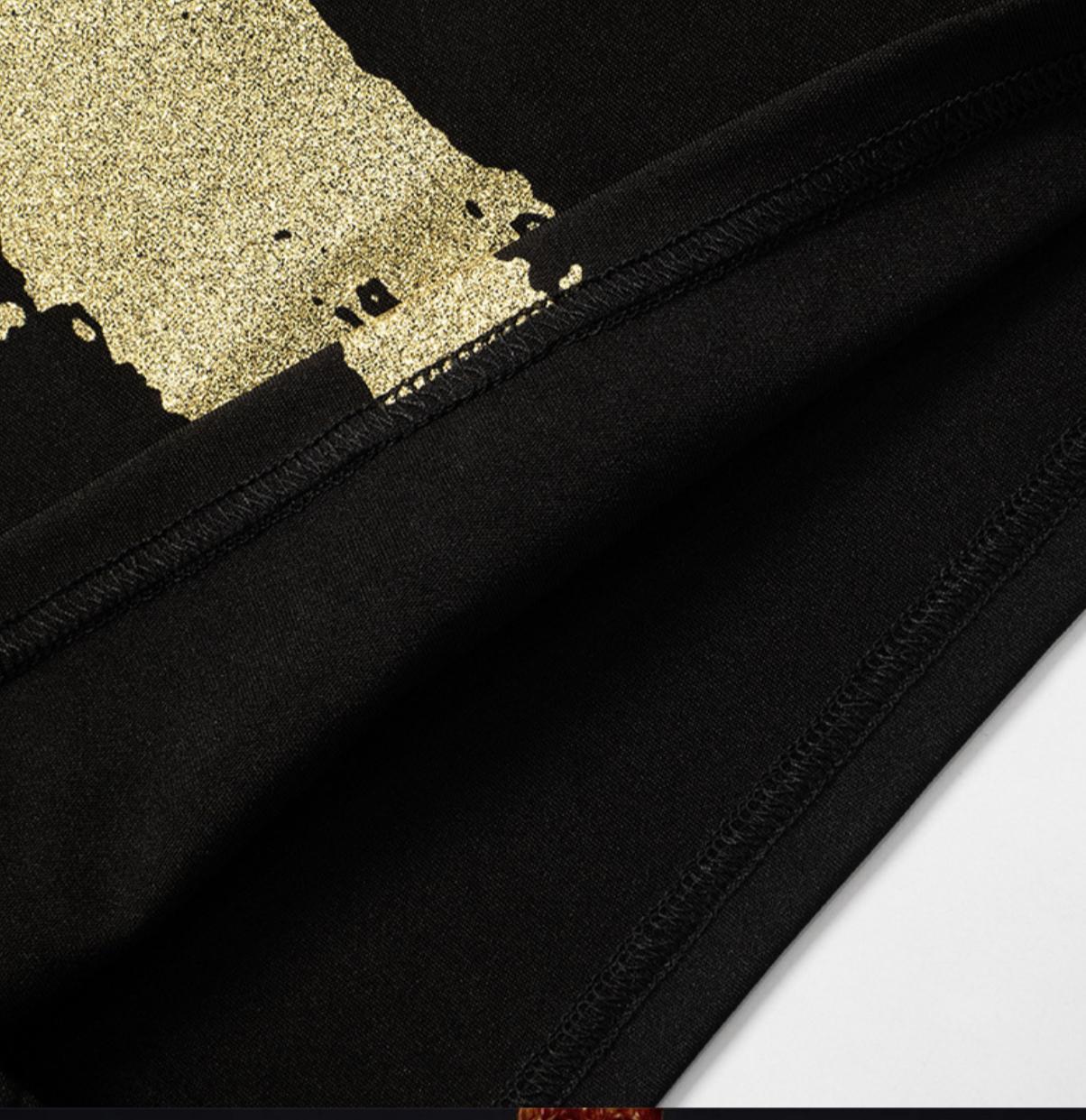 ROBE MINI NOIRE MANCHES LONGUES IMPRIMÉE GOLD