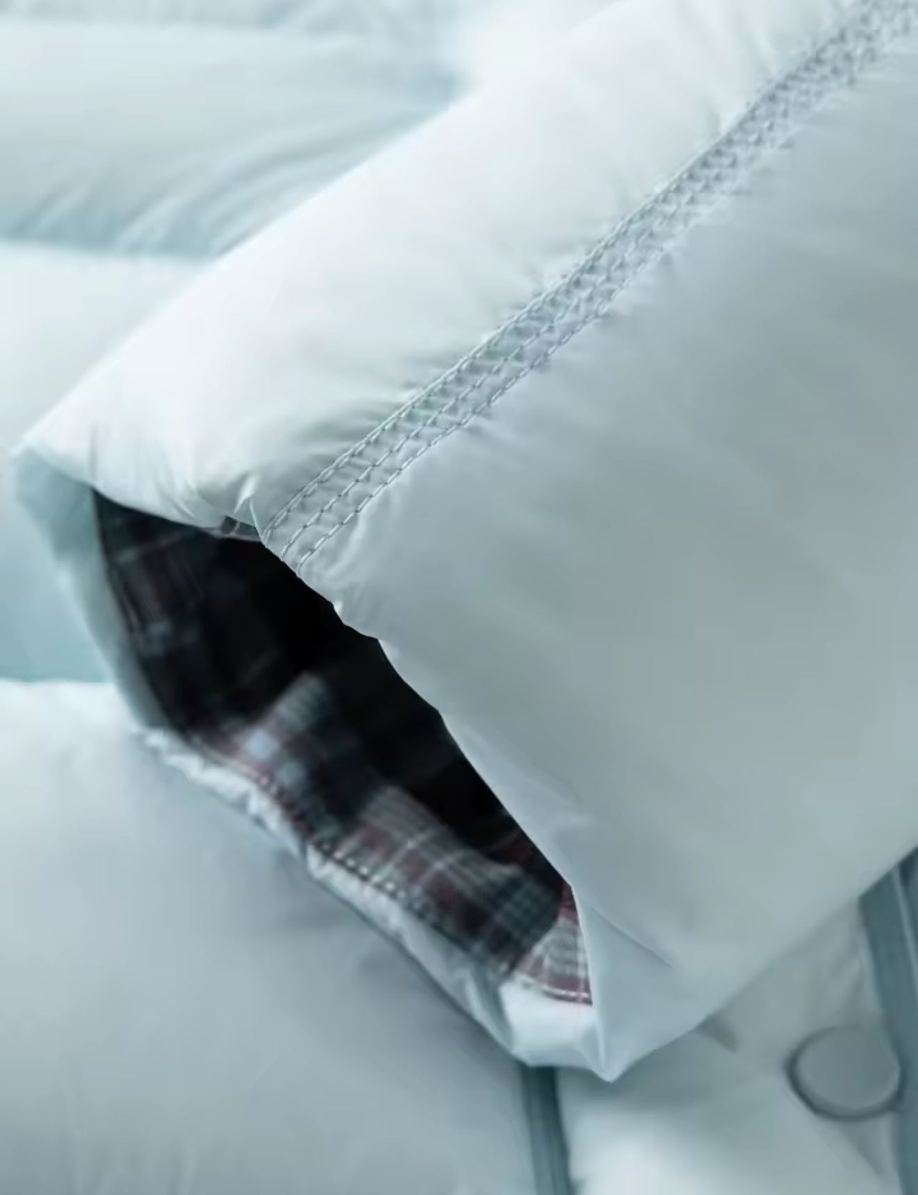 DOUDOUNE À CAPUCHE IMPERMÉABLE